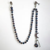 Garland 45: Sun  & Crescent / Tucker